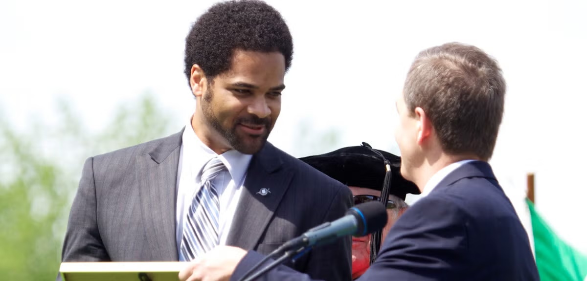 eli williamson receiving recognition at Luther College